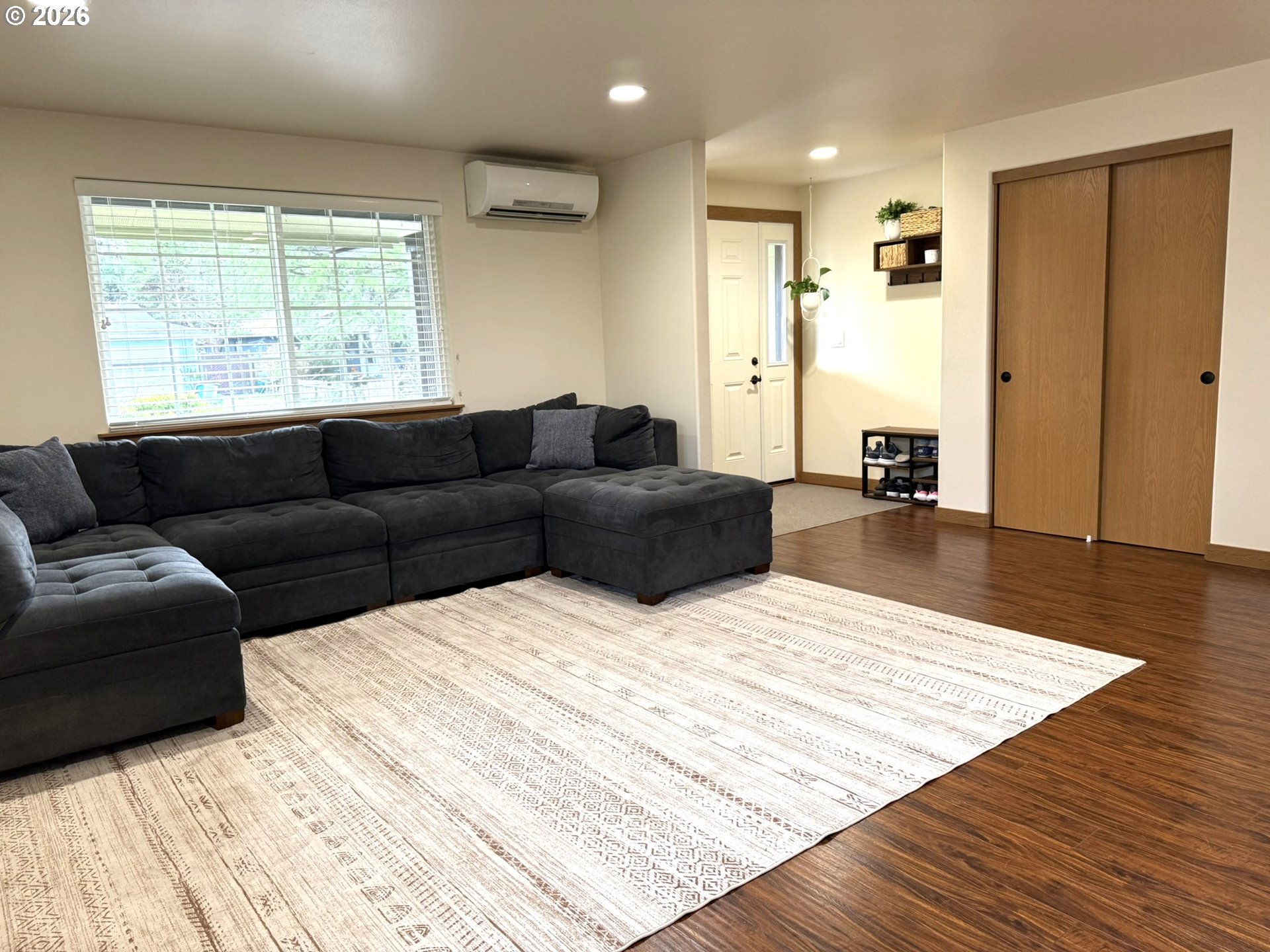 1651 29th Street Florence, OR 97439 - Photo 17 of 31 a living room with furniture and a large window