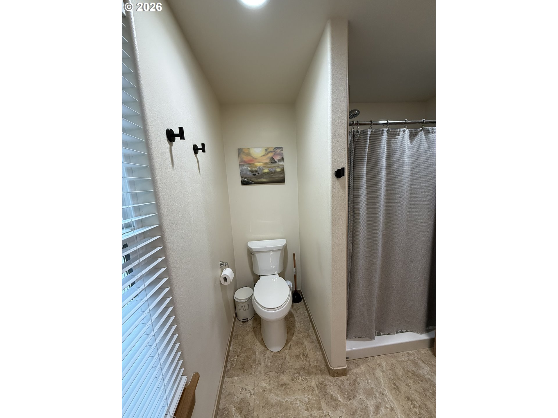 1651 29th Street Florence, OR 97439 - Photo 22 of 31 a view of a bathroom with a toilet
