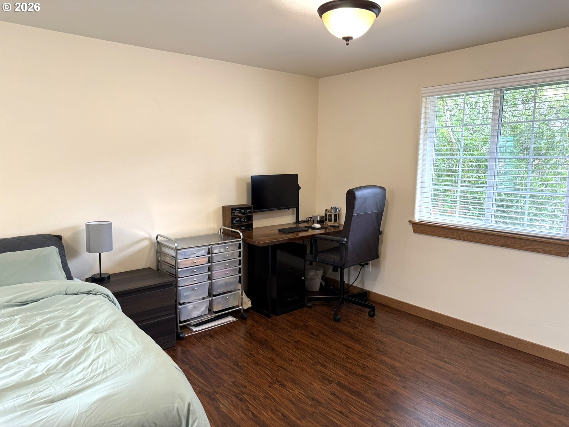 1651 29th Street Florence, OR 97439 - Photo 25 of 31 a bedroom with furniture and a window