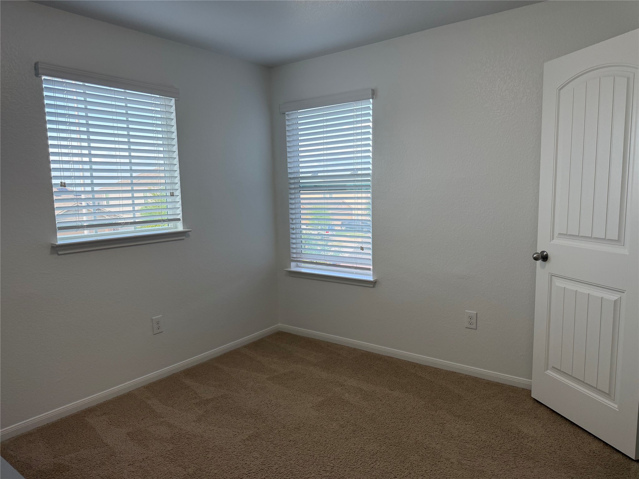 12111 Riprap Drive Manor, TX 78653 - Photo 14 of 14 an empty room with a window