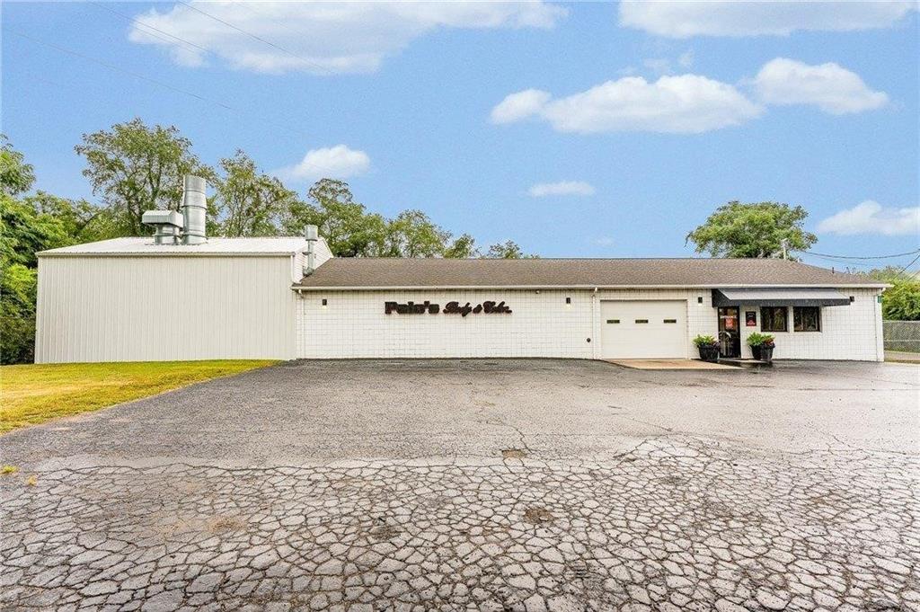 1859 McClellandtown Road Masontown, PA 15461 - Photo 4 of 19 a view of a house with a yard