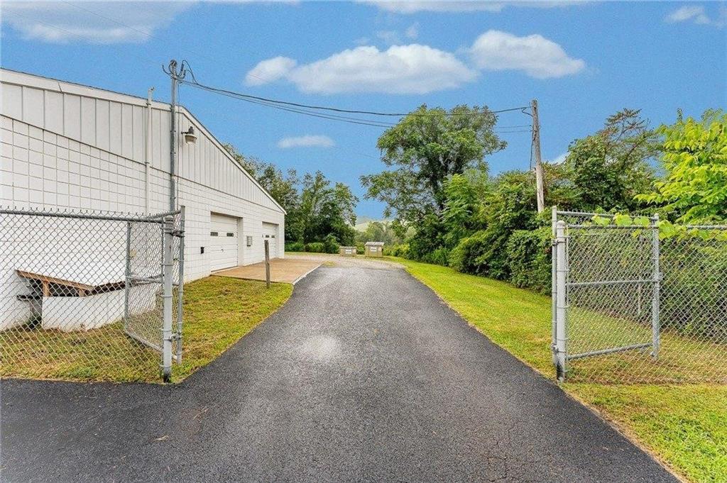 1859 McClellandtown Road Masontown, PA 15461 - Photo 9 of 19 a view of a house with backyard