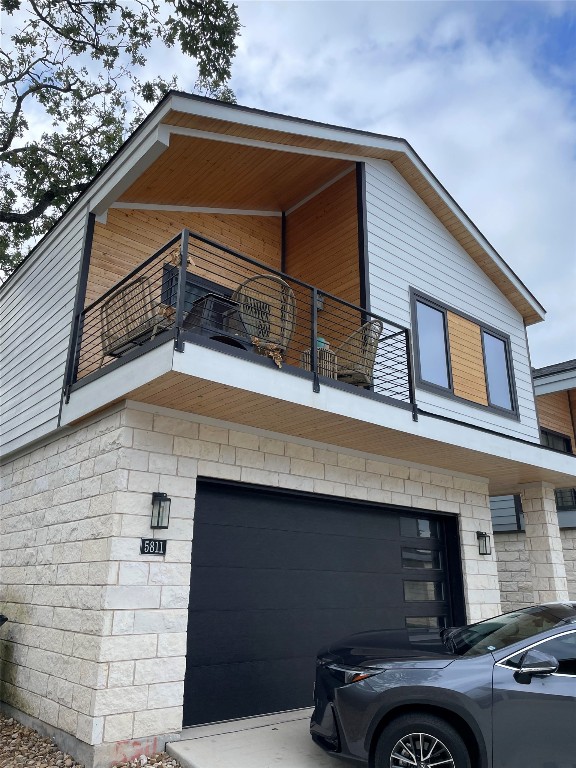 a front view of a house with parking
