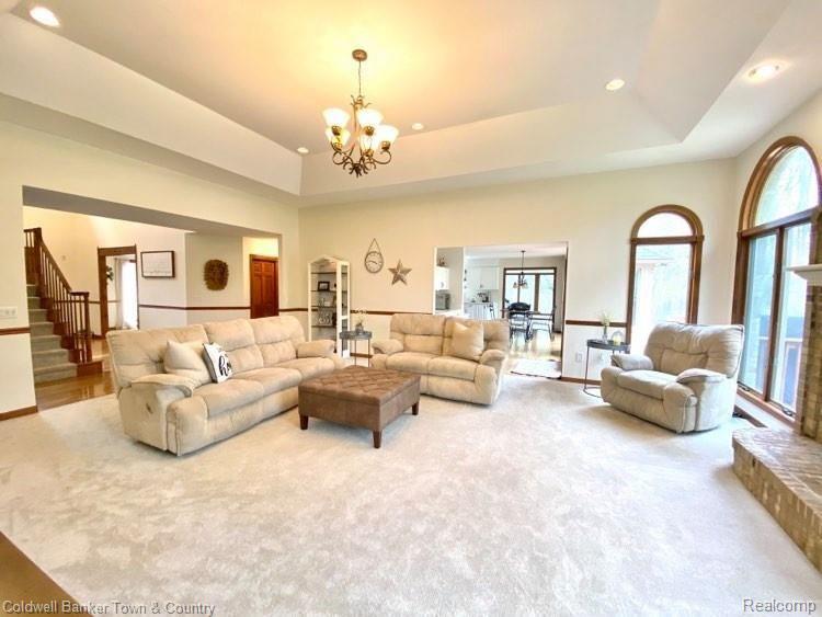 4233 Augusta Court Howell, MI 48843 - Photo 11 of 49 Fabulous Family Room with Trey Ceilings, Recessed Lighting & Filled w/Natural Light!