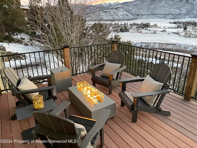 a view of a terrace with seating area