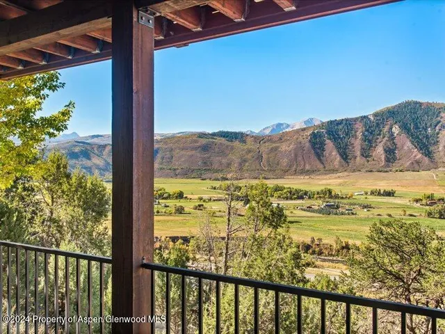 a view of a city from a balcony