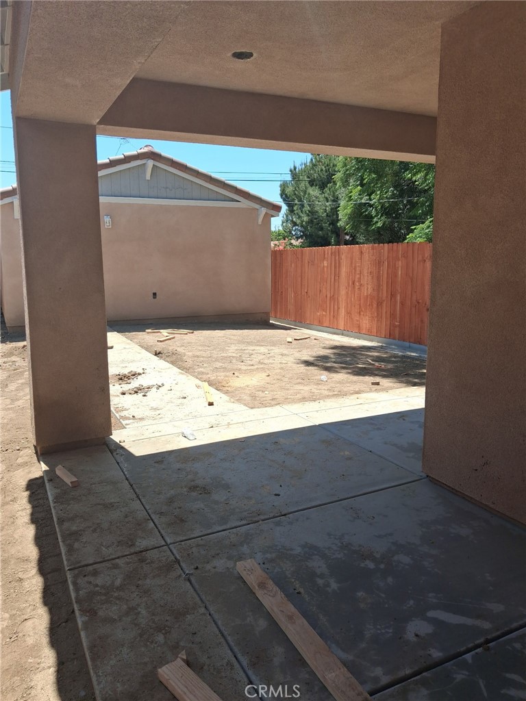 244 West N Street Colton, CA 92324 - Photo 2 of 2 an empty room with wooden floor