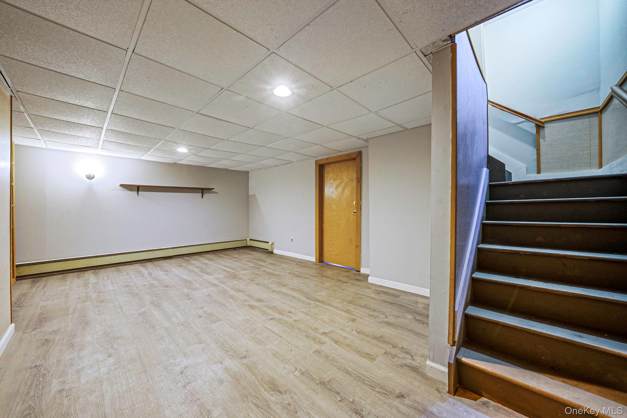 71 Loop Drive Sayville, NY 11782 - Photo 32 of 45 a view of an empty room with stairs and ventilation