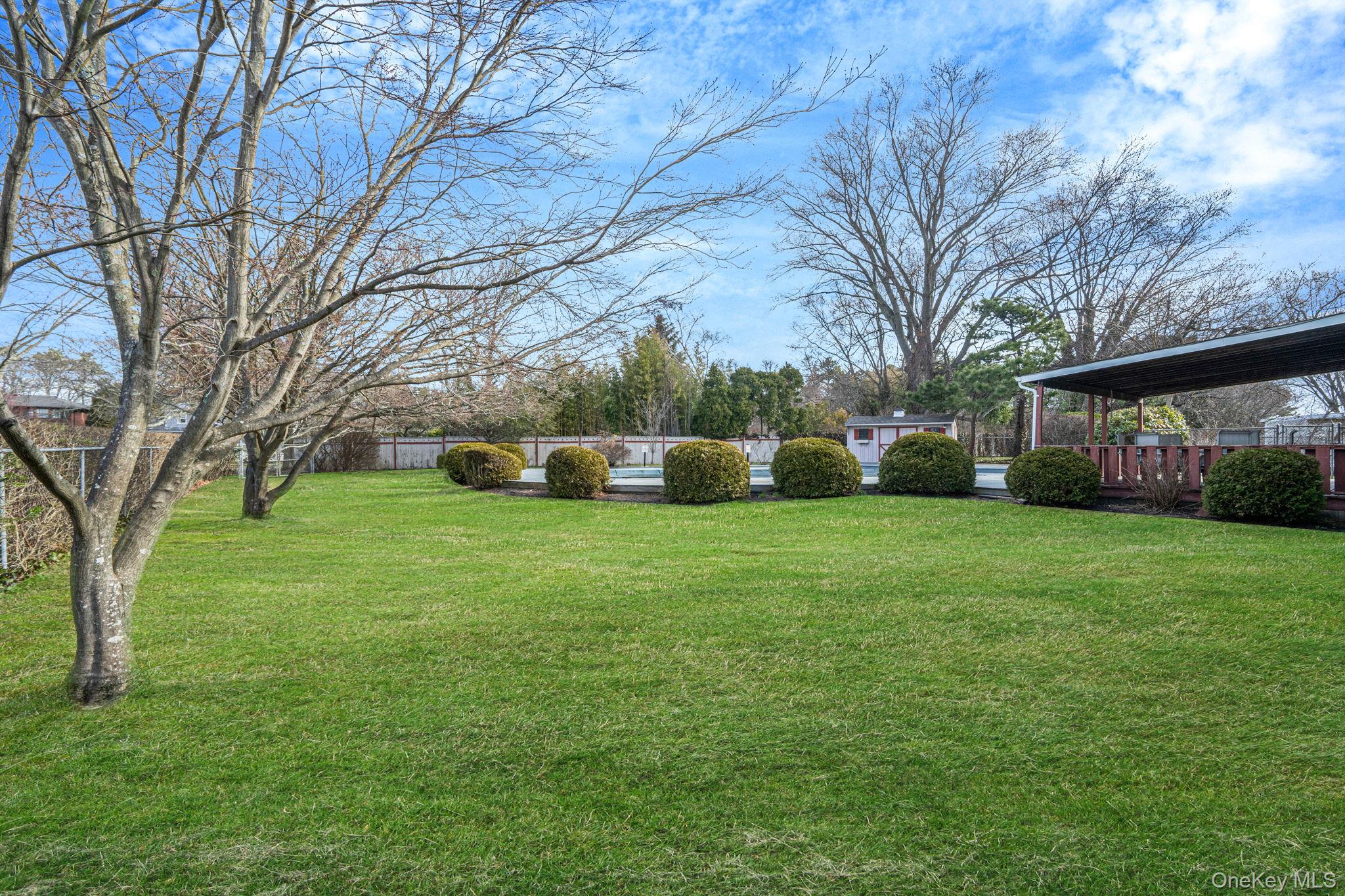 71 Loop Drive Sayville, NY 11782 - Photo 39 of 45 a view of a house with backyard