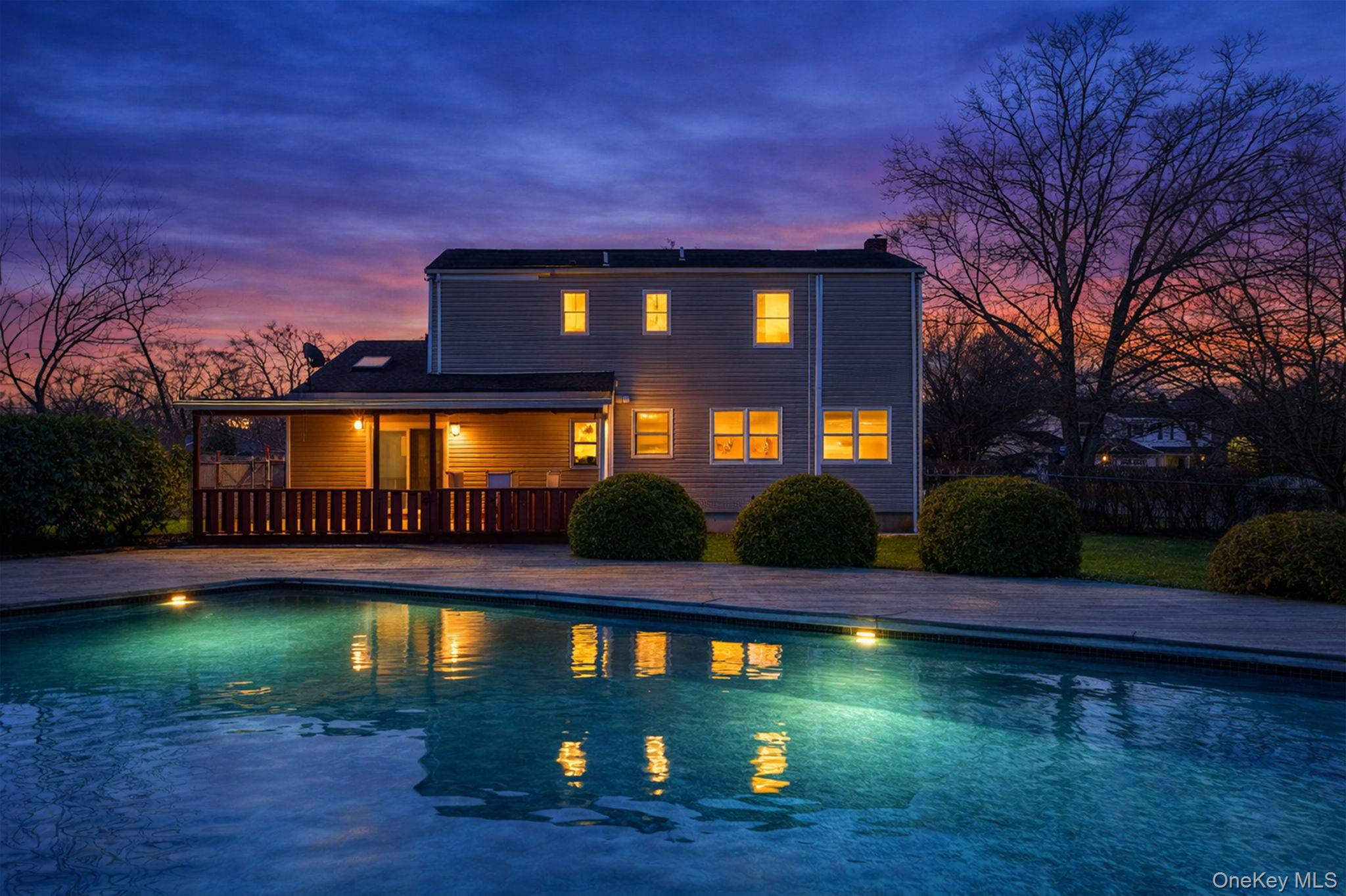 71 Loop Drive Sayville, NY 11782 - Photo 43 of 45 a view of swimming pool is middle in the garden