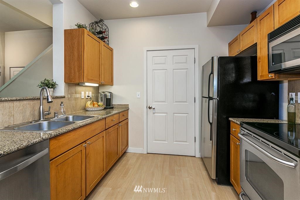 18930 Bothell Everett Highway, Unit J106 Bothell, WA 98012 - Photo 7 of 25