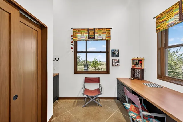 a room with furniture and a window