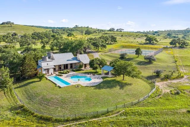 a view of a swimming pool with an ocean view