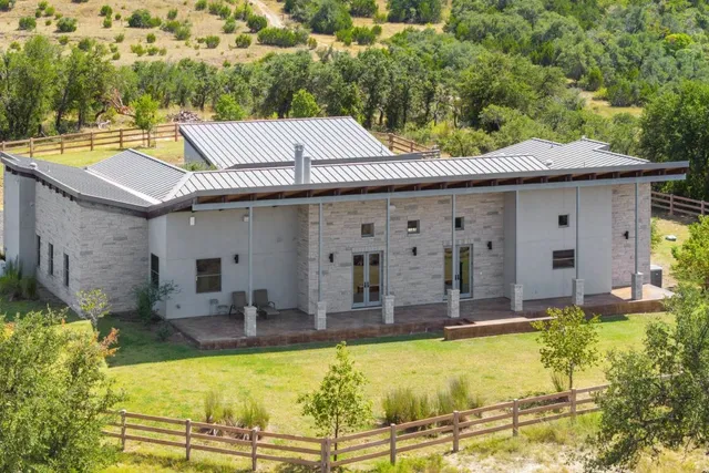 a view of a house with swimming pool