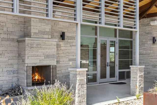 a view of a door of a building with a window