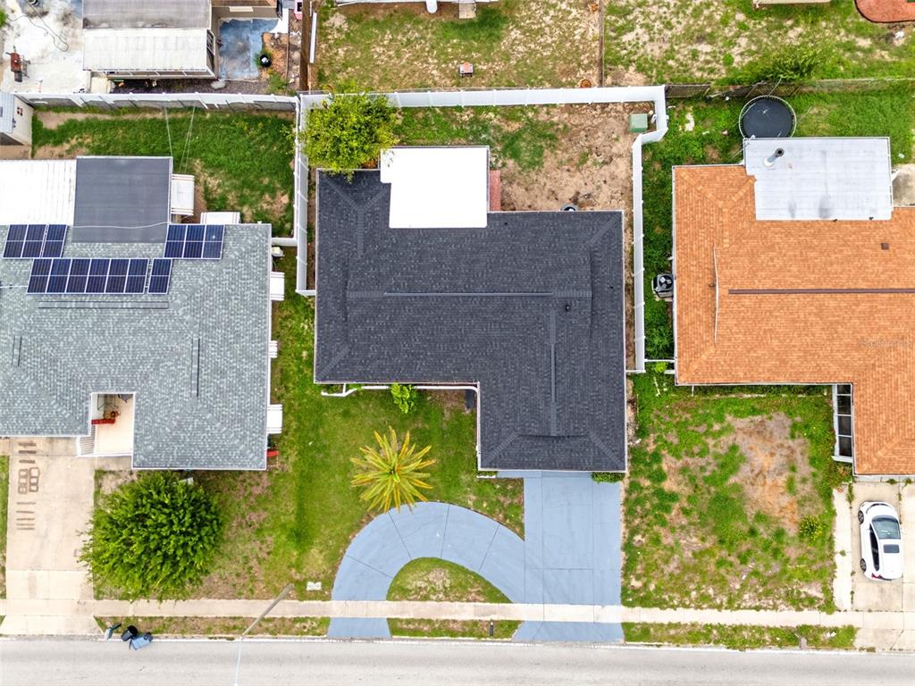 5626 Moog Road Holiday, FL 34690 - Photo 38 of 38 an aerial view of a house with a yard basket ball court and outdoor seating