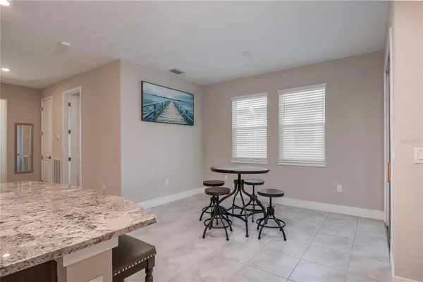 a view of a livingroom with furniture and window
