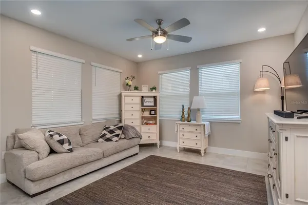 a living room with furniture and window