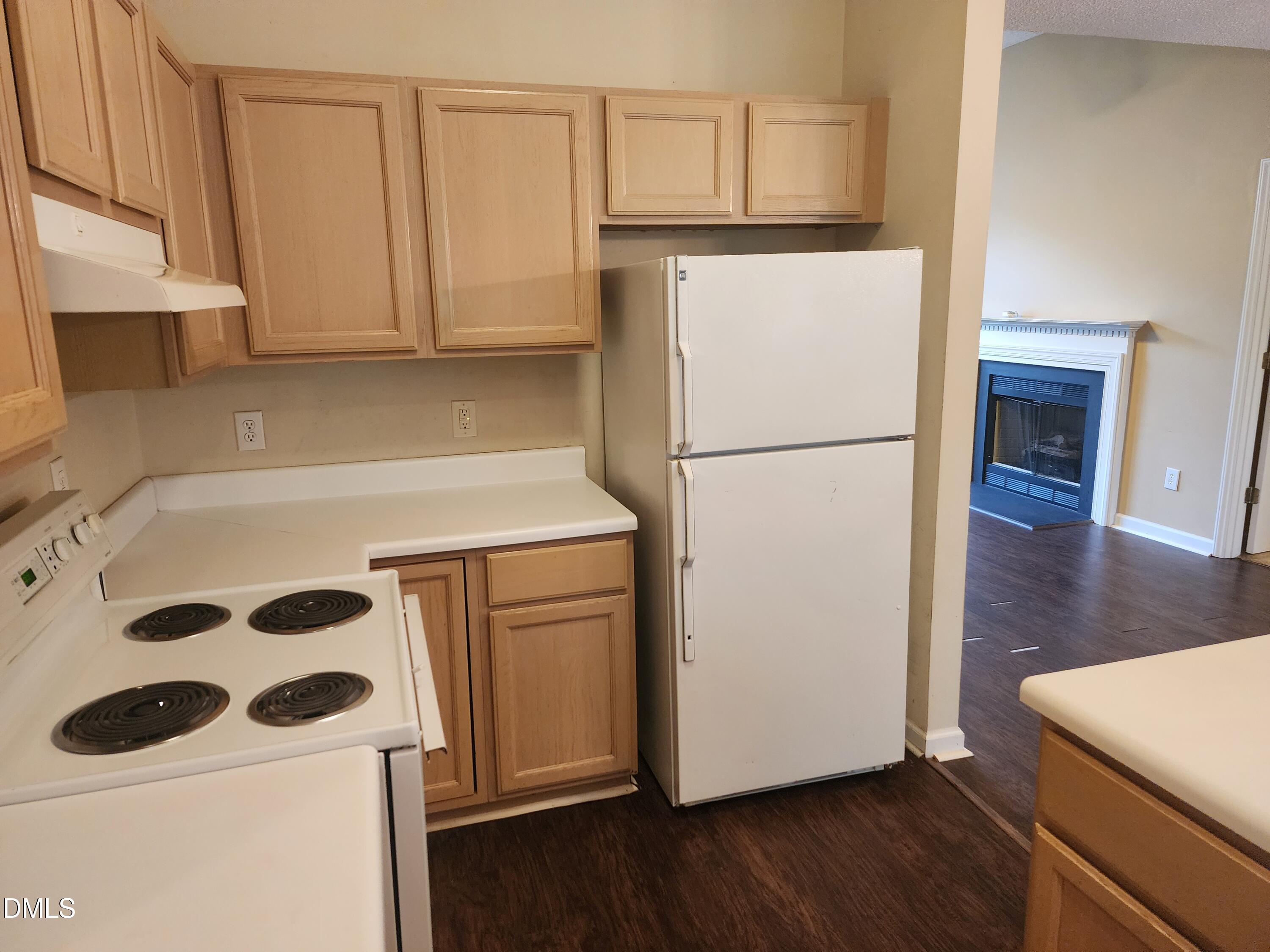 518 Johnson Street Garner, NC 27529 - Photo 6 of 17 a white refrigerator freezer sitting inside of a kitchen