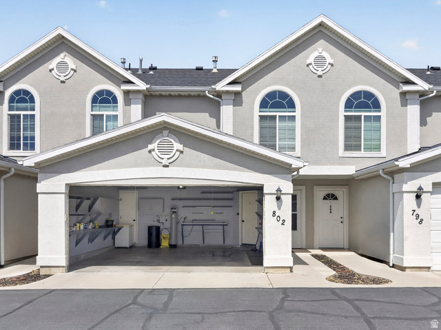 802 Sugar Maple Court Payson, UT 84651 - Photo 21 of 30 View of front of property featuring stucco siding, a garage, and driveway