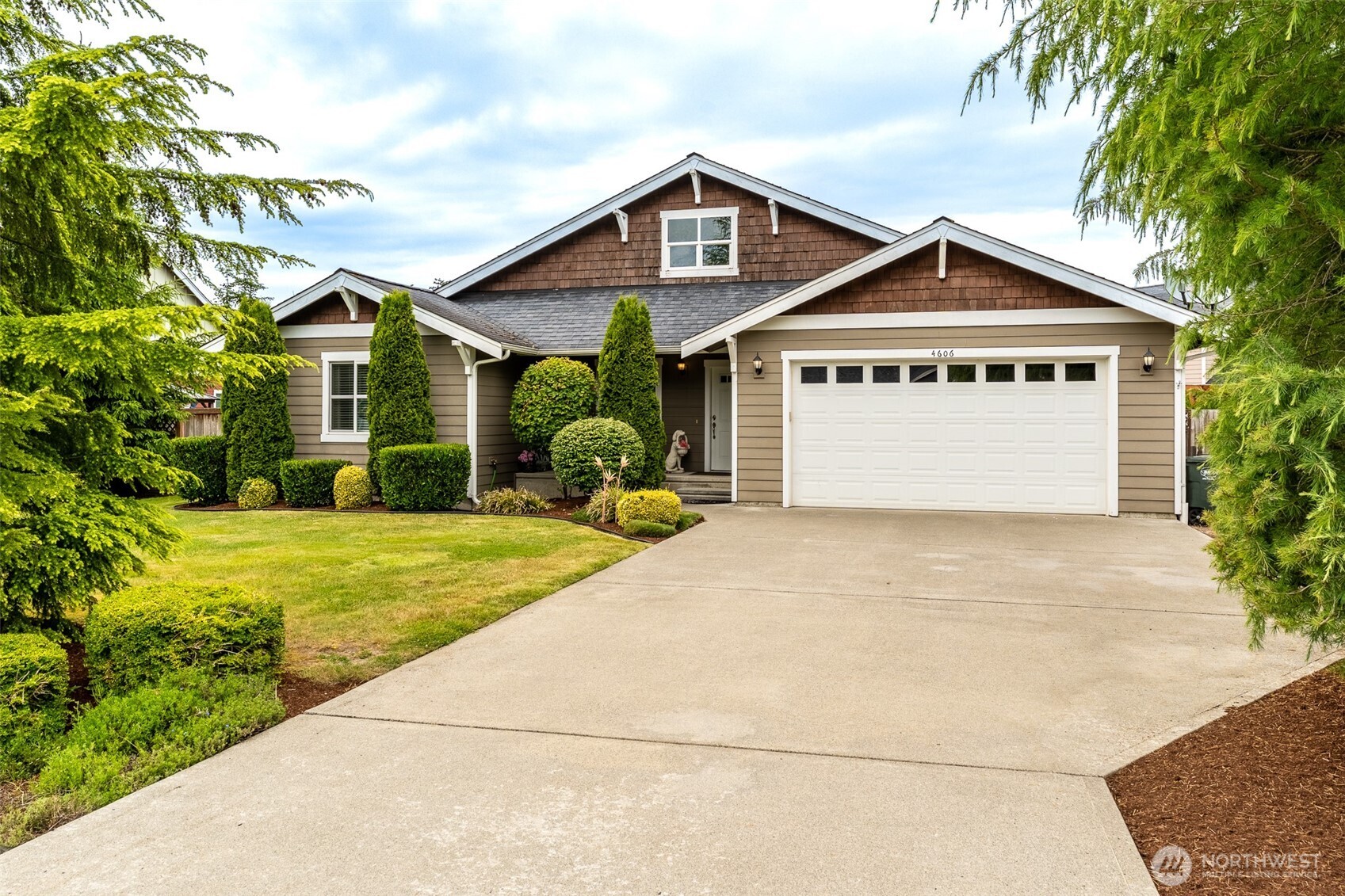 4606 Hall Road Blaine, WA 98230 - Photo 23 of 37 a front view of a house with a yard and garage