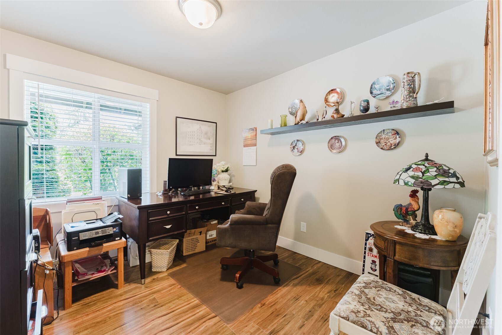 4606 Hall Road Blaine, WA 98230 - Photo 3 of 37 a view of a workspace with furniture and a window