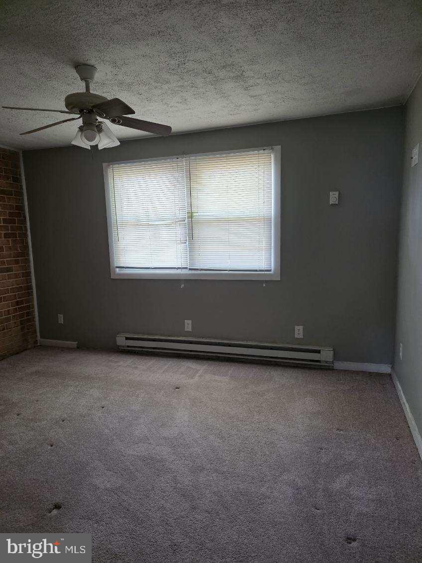 10 Archer Circle Newark, DE 19702 - Photo 5 of 12 an empty room with a window