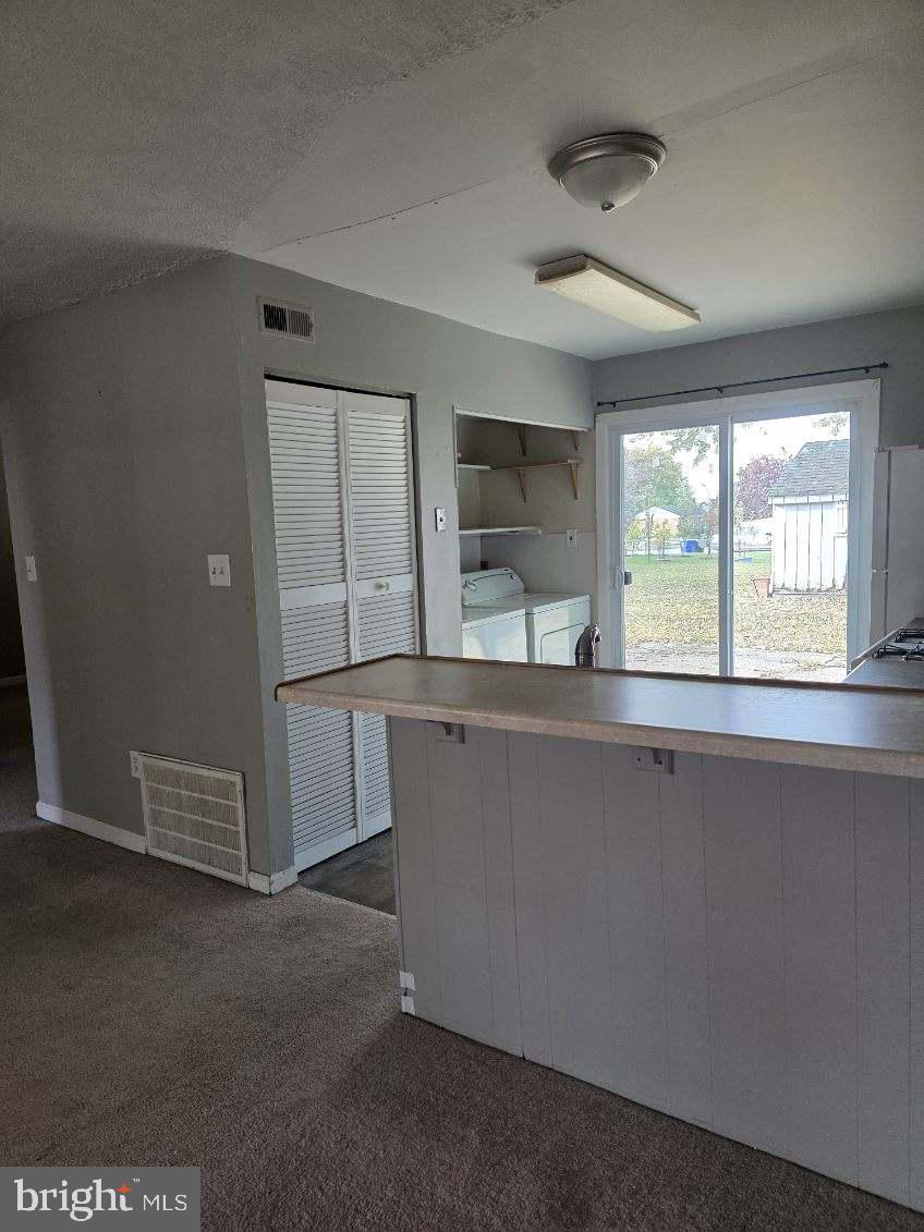 10 Archer Circle Newark, DE 19702 - Photo 6 of 12 wooden floor in an empty room with a window