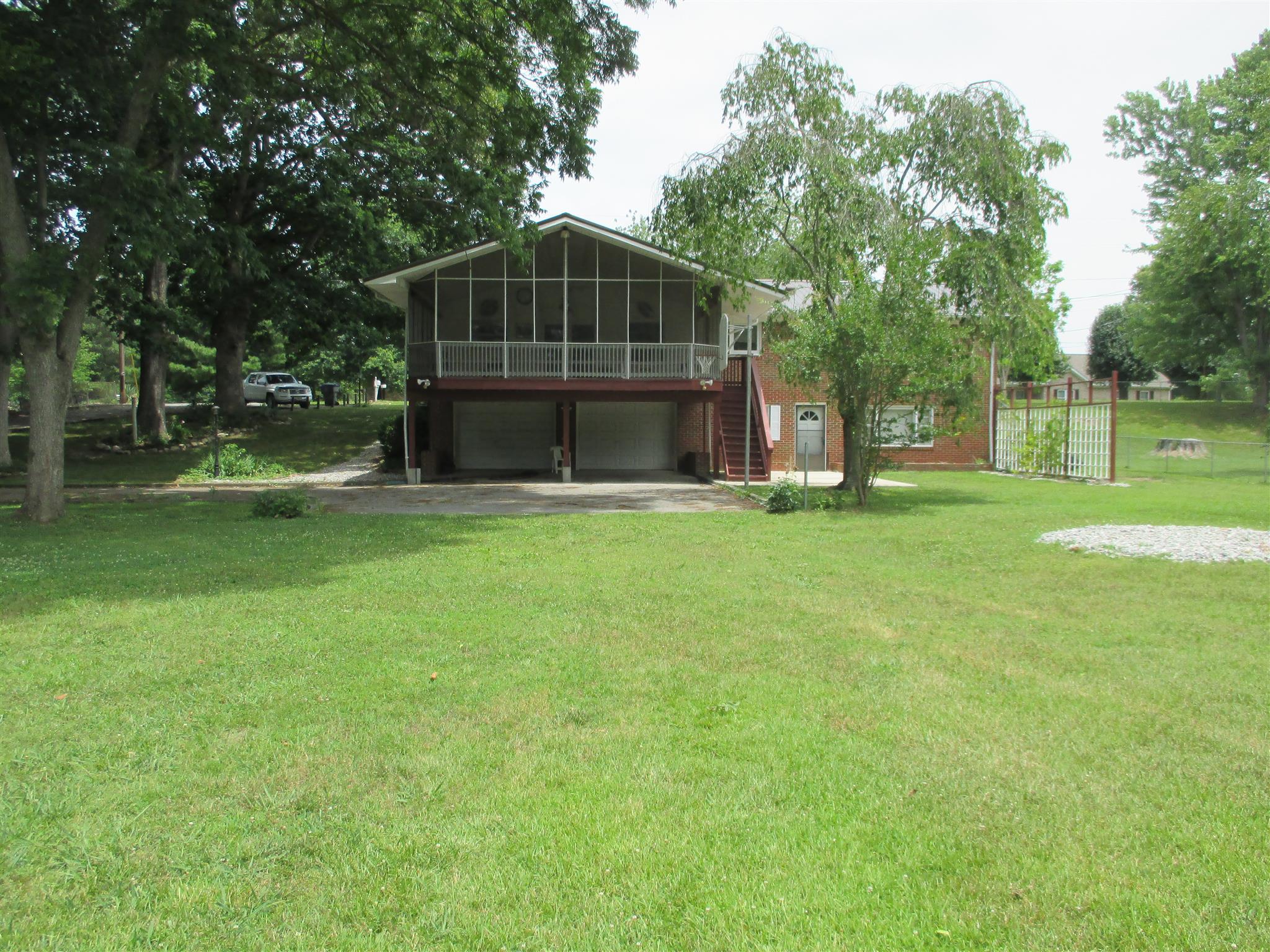 304 Shelton Road Manchester, TN 37355 - Photo 7 of 21 a view of a house with a yard