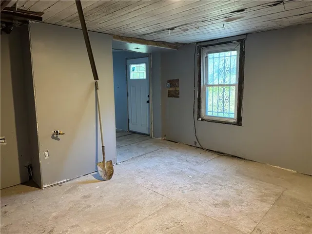 an empty room with windows