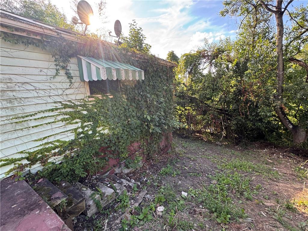 809 Middle Street Braddock, PA 15104 - Photo 25 of 26 a view of a house with a yard