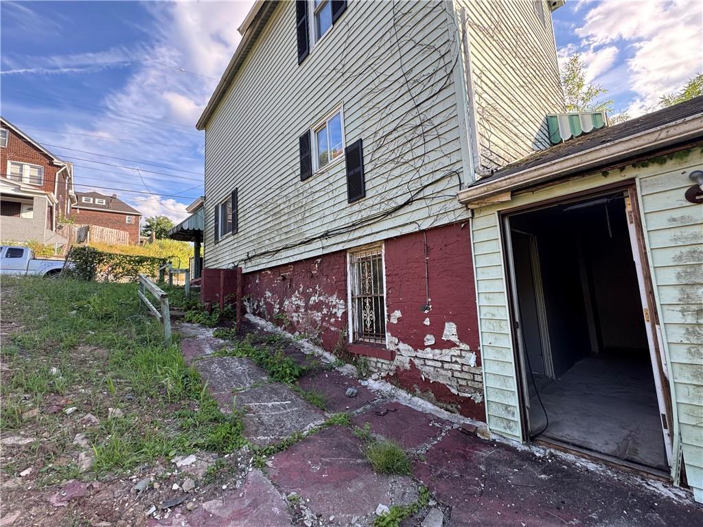 809 Middle Street Braddock, PA 15104 - Photo 26 of 26 a view of a house with a yard and pathway
