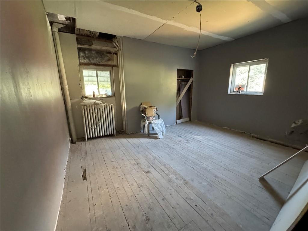 809 Middle Street Braddock, PA 15104 - Photo 7 of 26 a view of a room with wooden floor and windows