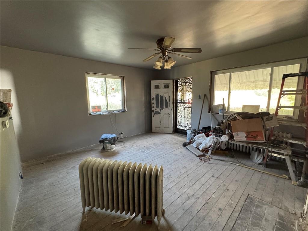 809 Middle Street Braddock, PA 15104 - Photo 10 of 26 a bedroom with furniture and a large window