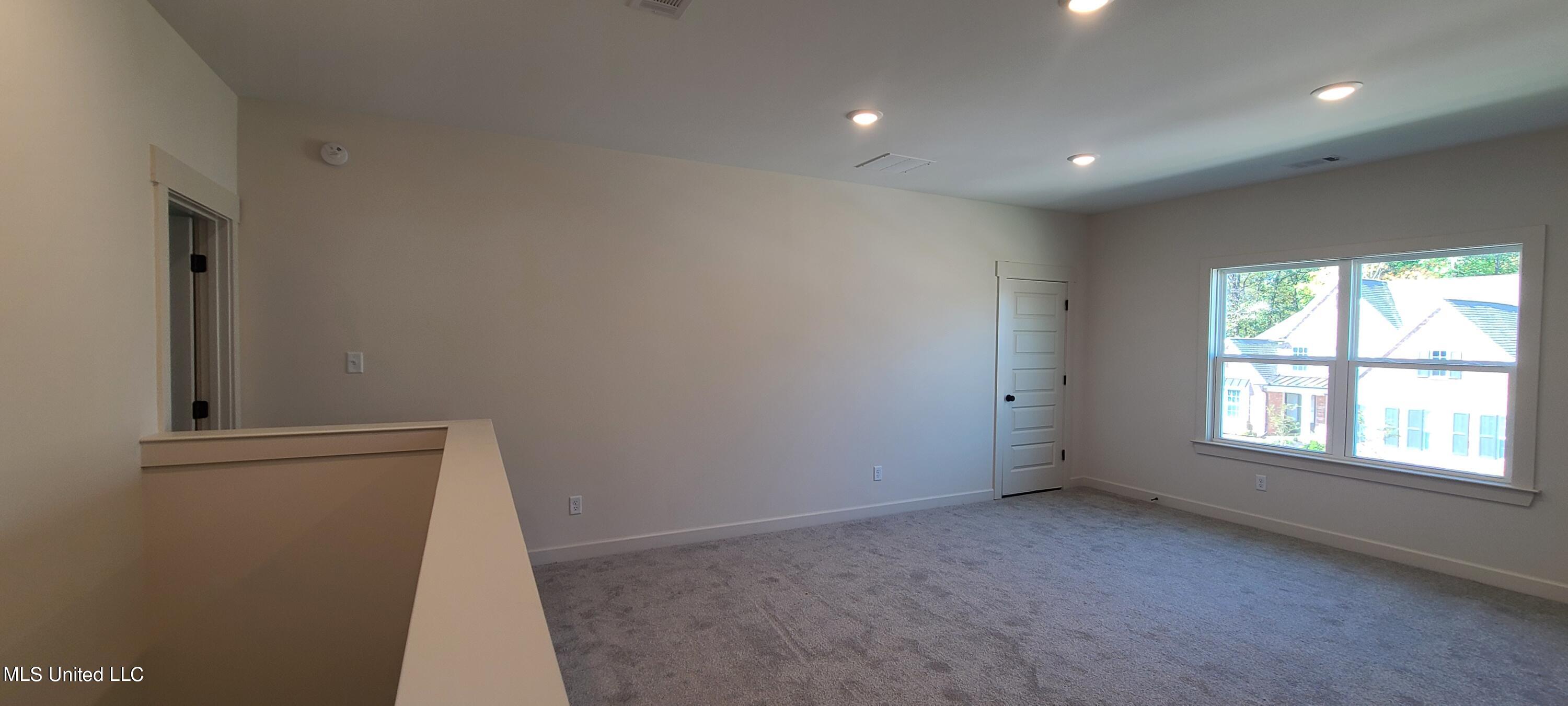 393 Ruskin Loop Hernando, MS 38632 - Photo 25 of 29 Open Playroom
