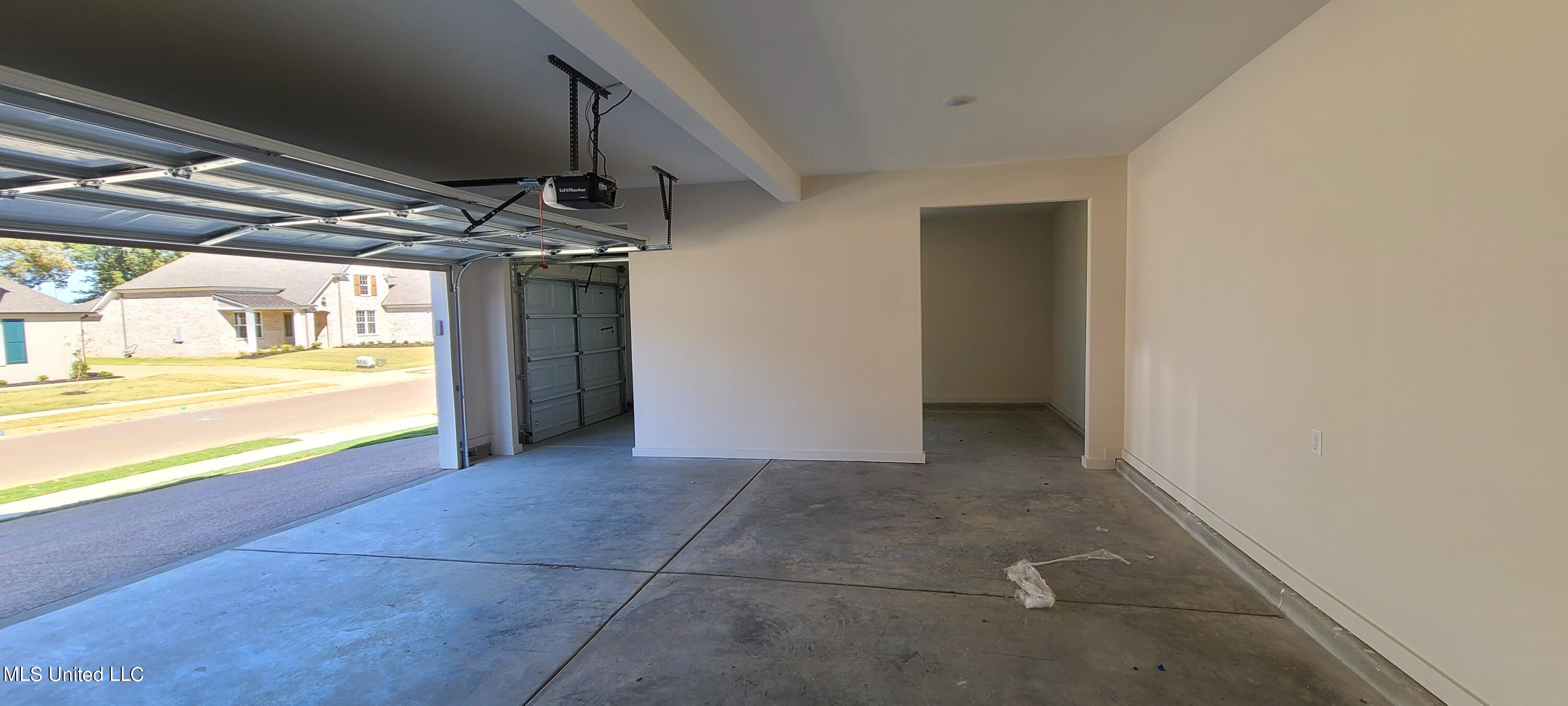 393 Ruskin Loop Hernando, MS 38632 - Photo 29 of 29 3 Car Garage