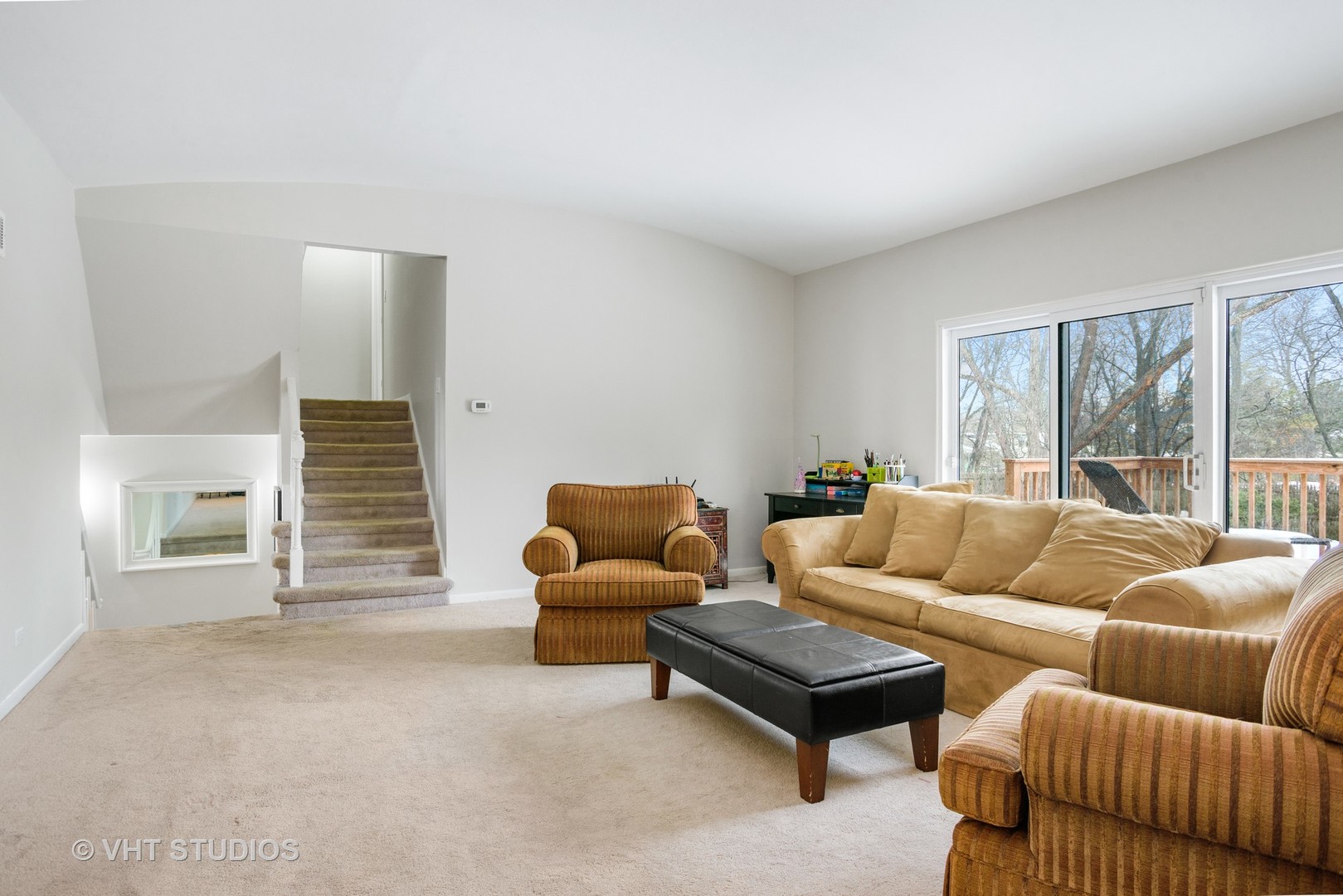 55 Ferndale Road Deerfield, IL 60015 - Photo 4 of 16 a living room with furniture and a large window