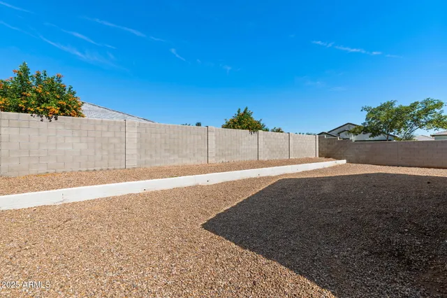 a spacious bathroom with a granite countertop tub and a sink