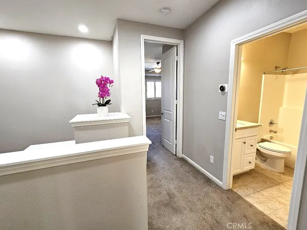 a bathroom with a sink vanity and a mirror