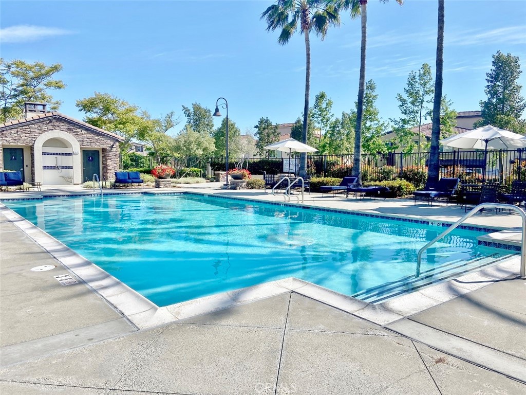 44011 Rivo Court Temecula, CA 92592 - Photo 36 of 39 a front view of house with yard and outdoor seating