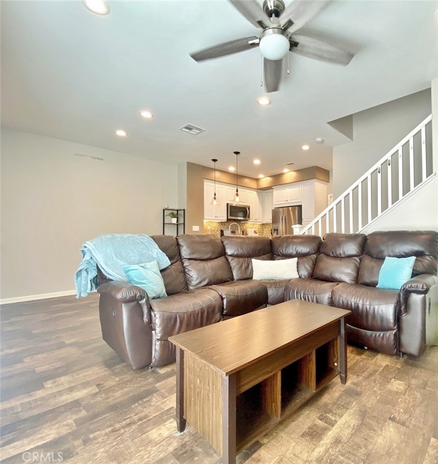 44011 Rivo Court Temecula, CA 92592 - Photo 5 of 39 a living room with furniture and a chandelier