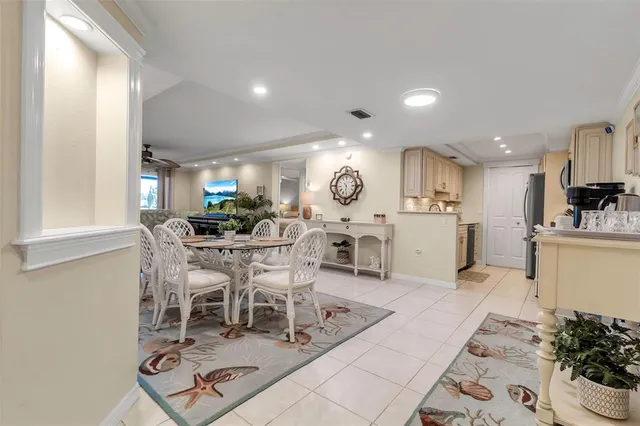 a view of a dining room kitchen and a window