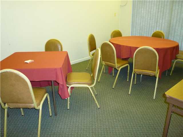 4345 Trevi Court, Unit 208 Lake Worth, FL 33467 - Photo 17 of 20 a dining room with furniture and a potted plant