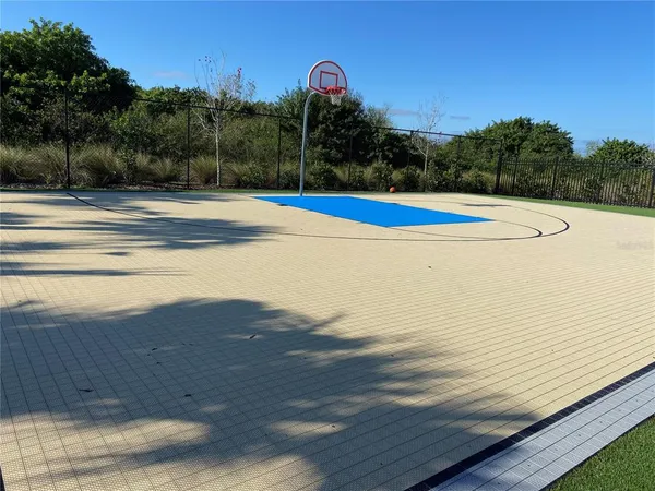 a view of a chairs and table in patio