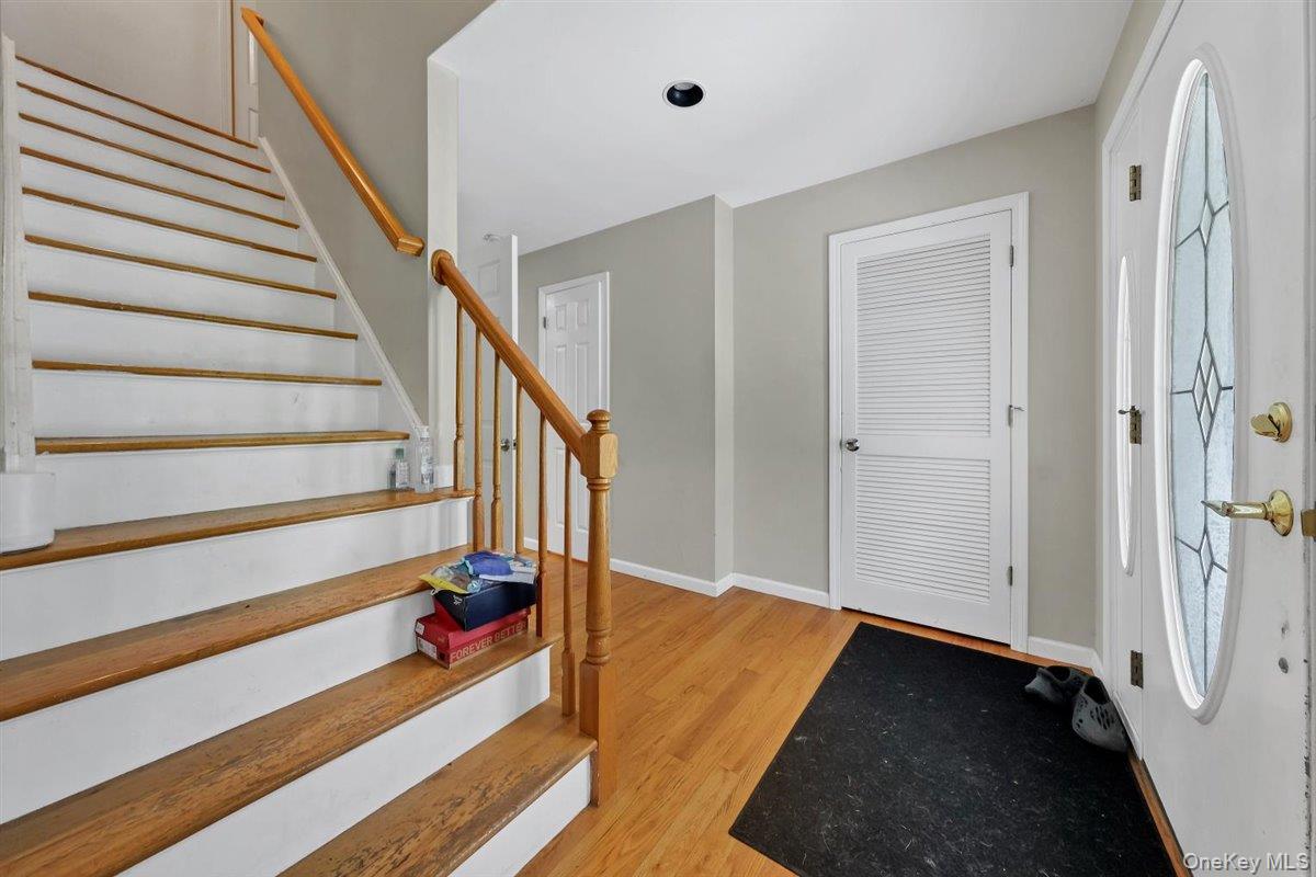 220 Prospect Road Monroe, NY 10950 - Photo 11 of 42 Foyer entrance featuring light wood finished floors and stairway
