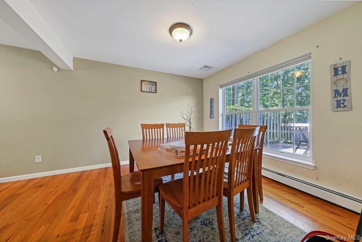 220 Prospect Road Monroe, NY 10950 - Photo 14 of 42 Dining area featuring baseboard heating and light wood finished floors