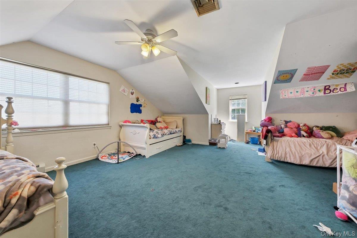 220 Prospect Road Monroe, NY 10950 - Photo 27 of 42 Bedroom with lofted ceiling, carpet, and ceiling fan