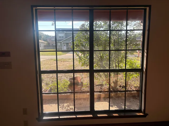 a view of balcony with wooden floor