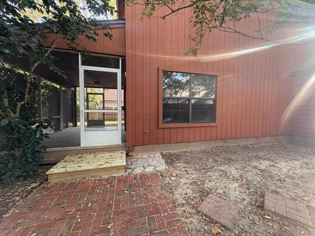 a view of a house with a yard and garage