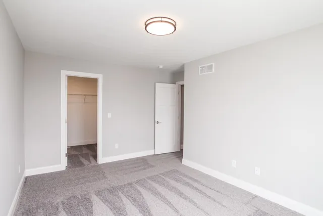 a view of a room with a fan